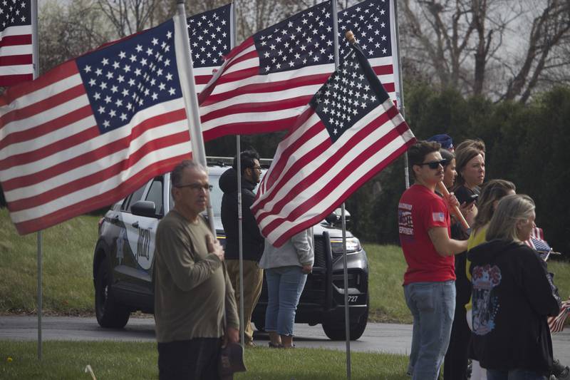 Attendees on Friday, April 18, 2025, outside Tezak Funeral Home in Joliet, for the funeral procession for U.S. Army Staff Sgt. Jose Dueñez Jr. He was one of four soldiers who died March 31, 2025 when their armored vehicle sunk in a bog during a training mission in Lithuania.