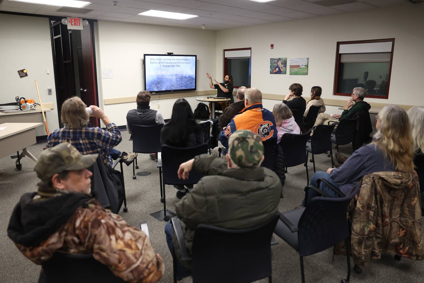 Over a dozen people attend an educational event on Forest Preserve District Will County controlled burns at Sugar Creek Administration Center in Joliet on Thursday, Jan 30, 2025.