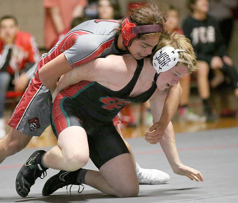 Ottawa's Anthony Evans wrestles L-P's Caeden Small in the 170 weight match during a wrestling meet in Sellett Gymnasium on Wednesday Dec. 7, 2022 at L-P High School.