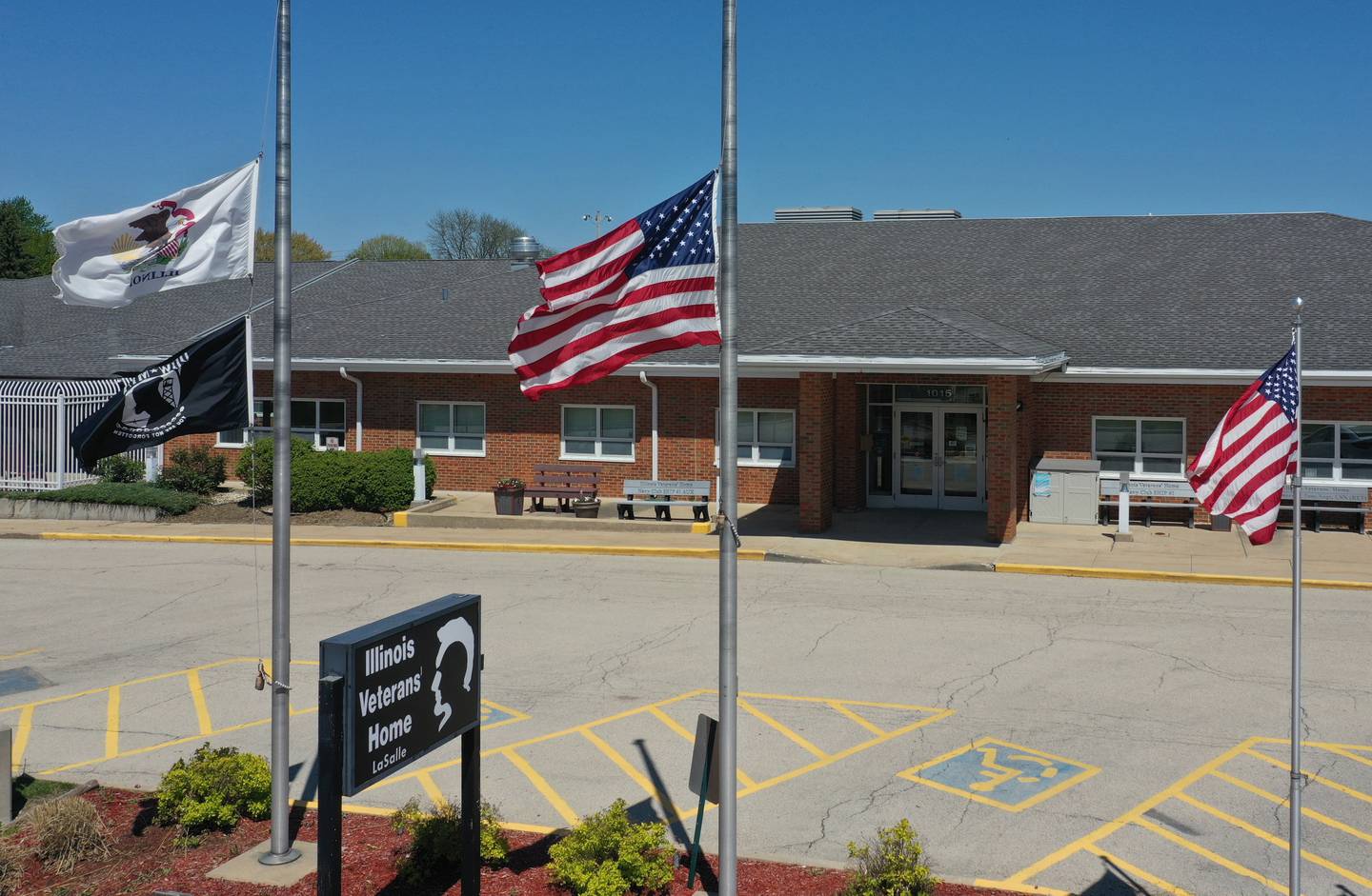 Flags blow in the wind outside the Illinois Veterans Home in La Salle