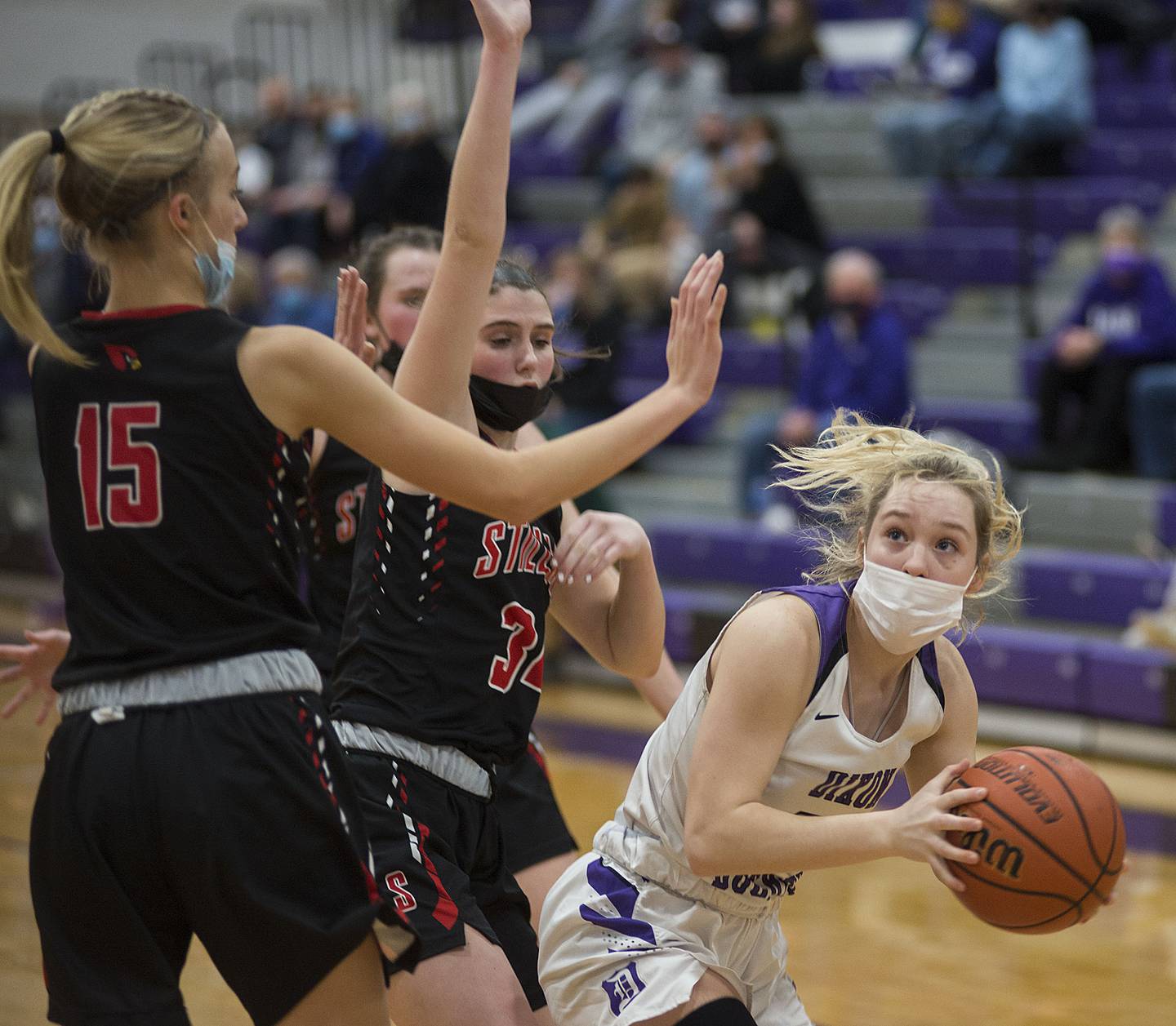 Dixon's Hannah Steinmeyer pulls down a rebound and looks to pass Wednesday, Dec. 29, 2021 against Stillman Valley. The two teams squared off in the championship game of the KSB Dixon girls holiday basketball tournament.