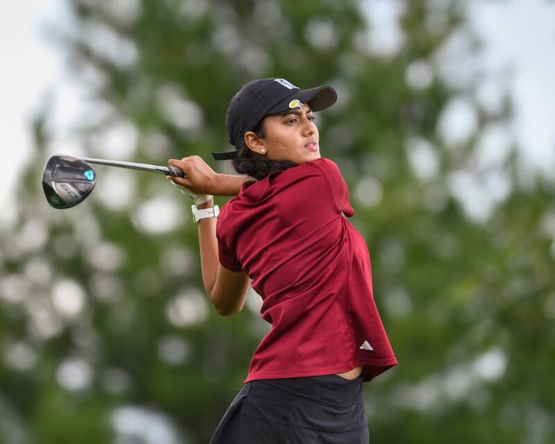 Naperville Central Ashika Patel tees off on the green in the back half of the regional match held on Thursday Sep. 28, 2023, at Whitetail Ridge in Yorkville.