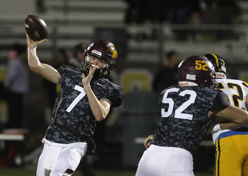 Richmond-Burton's JT Groh throws a pass during a Kishwaukee River Conference football game against  Harvard on Thursday, Oct.12, 2023, at Richmond-Burton High School.