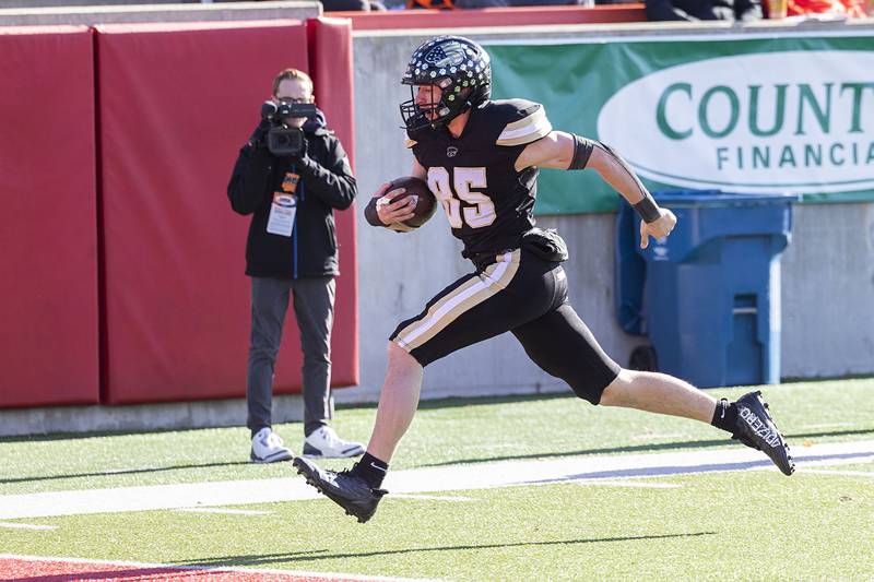 Lena-Winslow’s Aiden Wild heads for the end zone against Brown County Friday, Nov. 28, 2025, in the Class 1A football finals at Hancock Stadium at ISU.