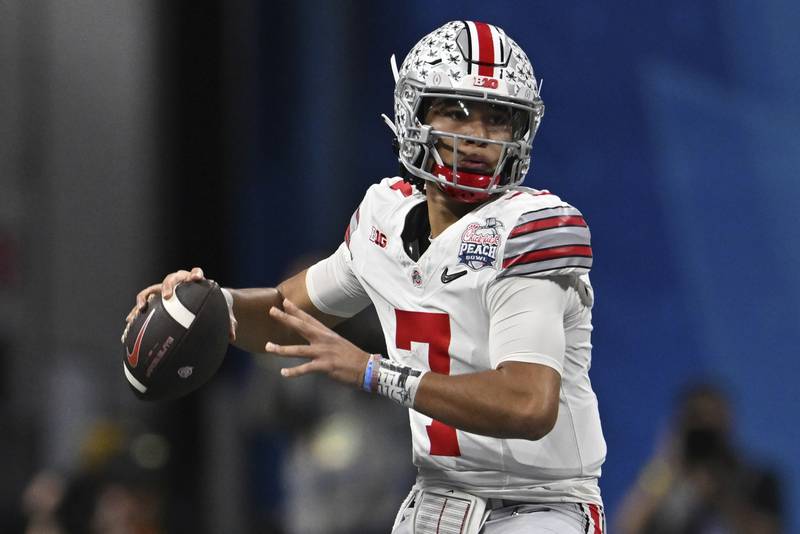 Ohio State quarterback C.J. Stroud passes against Georgia during the first half of the Peach Bowl, Saturday, Dec. 31, 2022, in Atlanta.