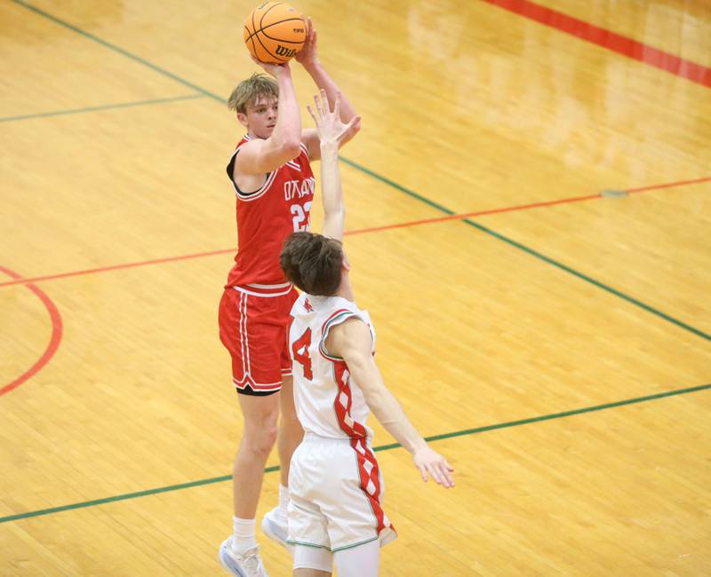 Ottawa's Owen Sanders shoots a jump shot over L-P's John Sowers during the Class 3A Regional title game on Wednesday, Feb. 25, 2026 in Sellett Gymnasium at L-P High School.