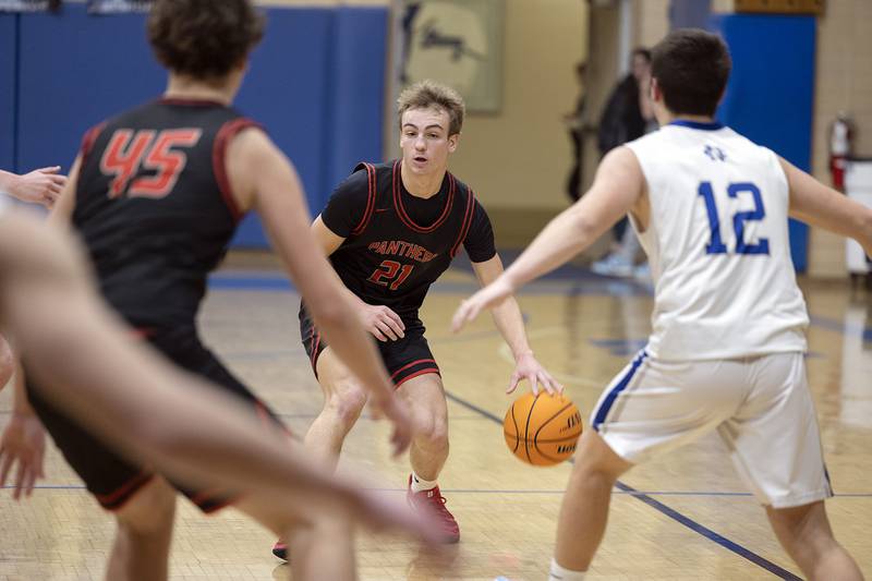 Erie-Prophetstown’s Keegan Winckler handles the ball against Newman Wednesday, Jan. 29, 2025, at Newman High School.