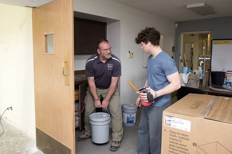 Whiteside Area Career Center building trades teacher Matthew Hicks works with students on several projects around the area, including the renovation of the kitchen and break room at the Regional Office of Education building in Sterling.