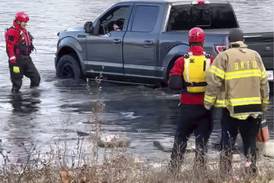 Pickup truck rolls into Fox River in Yorkville