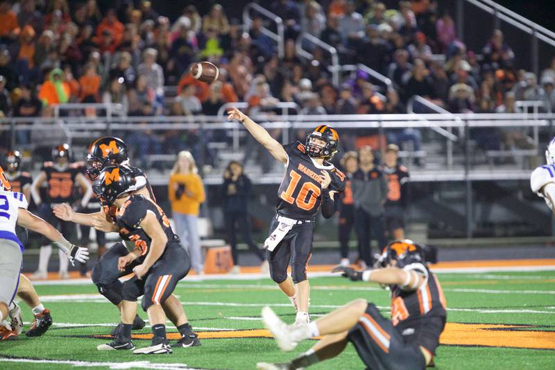 McHenry's Dominick Caruso throws for a gain against Burligton Central on Friday, Oct. 21,2022 in McHenry.
