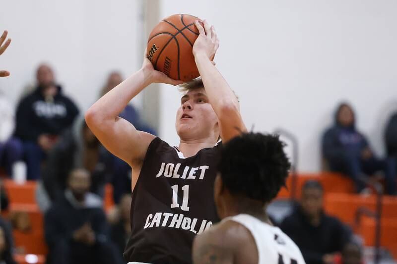 Joliet Catholic’s Drew Wills takes a shot against Prespectives in the Class 2A Julian Sectional championship on Friday, March 3rd, 2023 in Chicago.