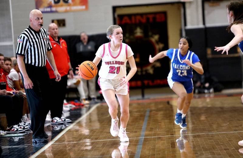 Batavia's Harper Haren drives toward the basket during a Class 4A St. Charles East Sectional semifinal against Wheaton North on Tuesday, Feb. 25, 2025 in St. Charles.
