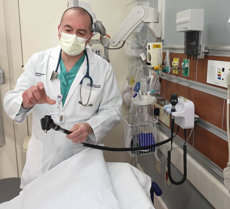 Dr. Jeremy Silver, medical director in the emergency department at Northwestern Medicine Kishwaukee Hospital, talks about state-of-the-art technology in one of the emergency room bays Monday, March 28, 2022, in the recently completed phase 2 of the three-phase renovation project in the ER at the facility.