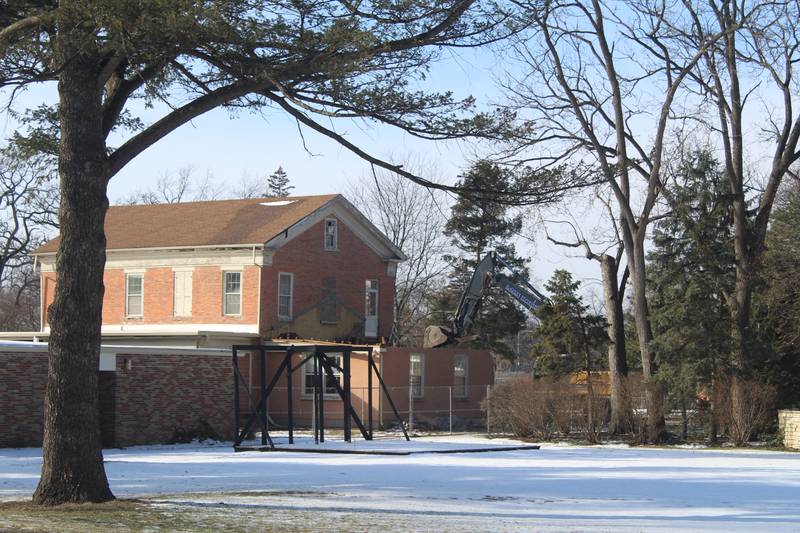 Demolition continued at the Academy Building, built in the 1850s, on the St. Mary's Episcopal Church property in Crystal Lake on Jan. 5, 2026.