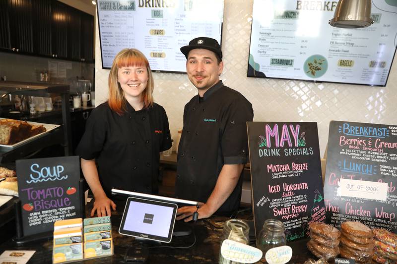 Bakers Molly Fraser (left) of Aurora and Austin Dabbert (right) of Wheaton joined the Corner Grind crew after both worked for Grahams 318 in Geneva, which closed in April.