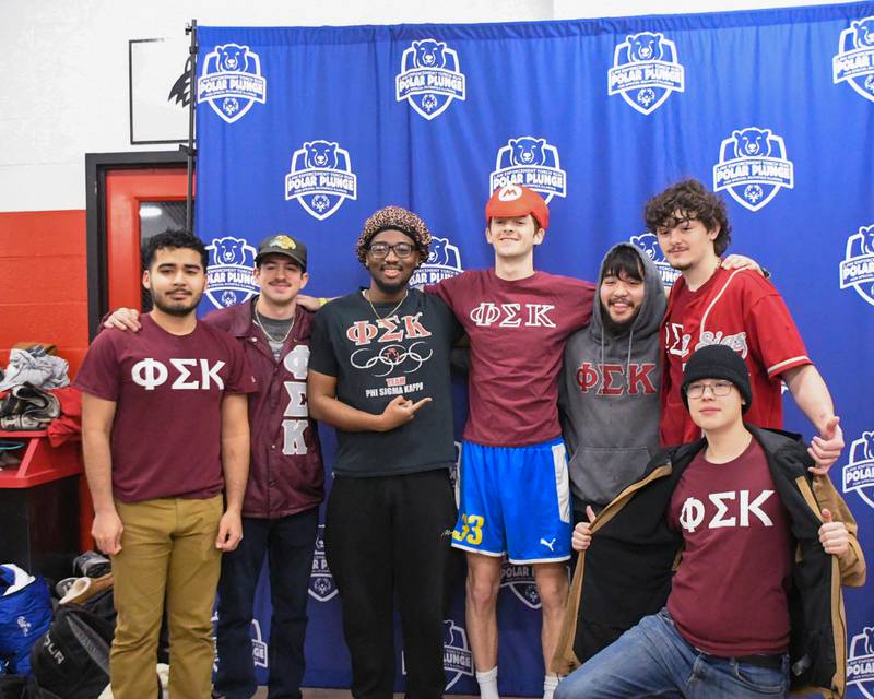 Phi Sigma Kappa fraternity brothers pose for a photo on Saturday, Feb. 15, 2025, before partaking in the 2nd annual Polar Plunge at Northern Illinois University's Huskie Stadium in DeKalb. Proceeds benefited the law enforcement torch run for Special Olympics.