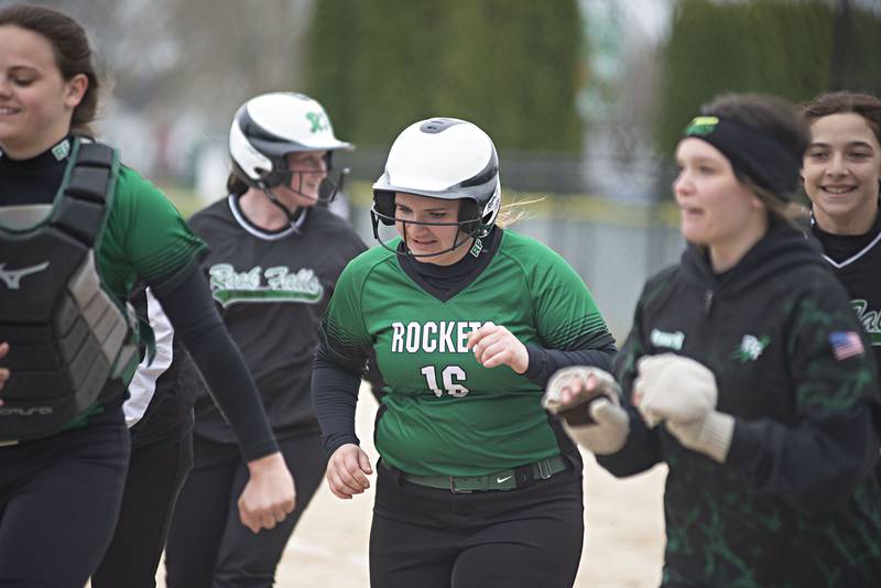 Rock Falls’ Zoe Morgan is congratulated after hitting a home run against North Boone Monday, April 25, 2022.