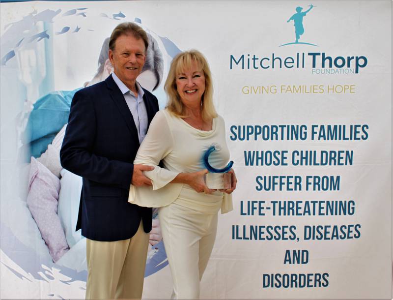 Brad and Beth Thorp, founders of Mitchell Thorp Foundation, created in memory of their son Mitchell Thorp who died from an undiagnosed illness. The couple received the Community Impact Award 2022 presented by the Carlsbad Chamber of Commerce, California where the live.