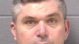 New Lenox gun shop owner back in Will County jail on theft by deception, burglary charges