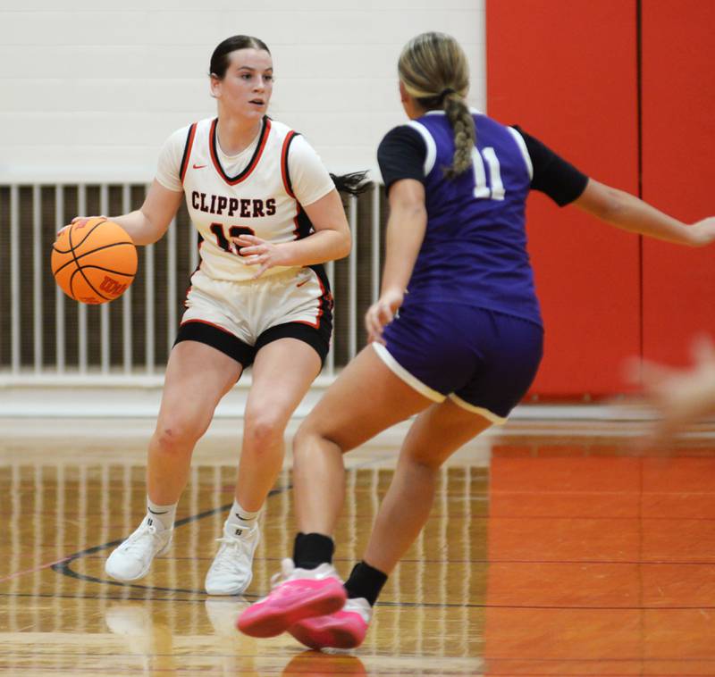 Amboy's Addison Pertell (11) looks to pass as  a Rochelle player defends at the Oregon Girls Basketball Tip-Off Tournament on Wednesday, Nov. 20, 2024 at the Blackhawk Center in Oregon.
