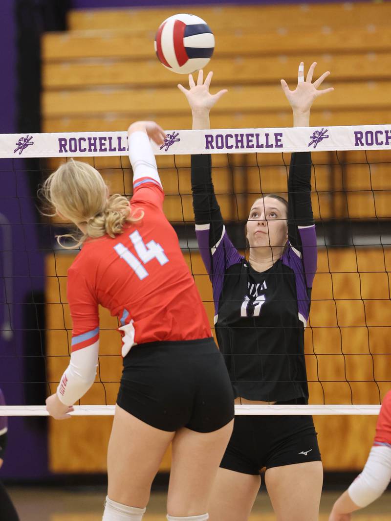 Dixon’s Lucy Feick tries to block Ottawa's Libby Muffler Tuesday, Oct. 28, 2025, during their Class 3A regional semifinal match at Rochelle High School.