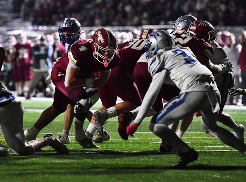 Morris' Mick Smith (4) rushes the ball during the class 4A first round playoff game against Woodstock on Friday, OCT. 31, 2025, at Morris.