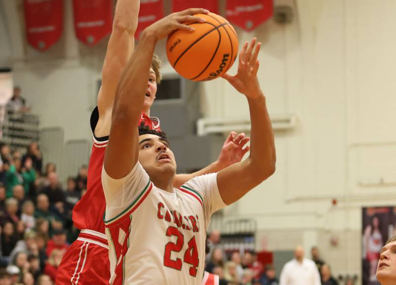 L-P's Marion Persich drives to the hoop in front of Ottawa's Owen Sanders on Friday, Jan. 9, 2026 in Sellett Gymnasium at L-P High School.