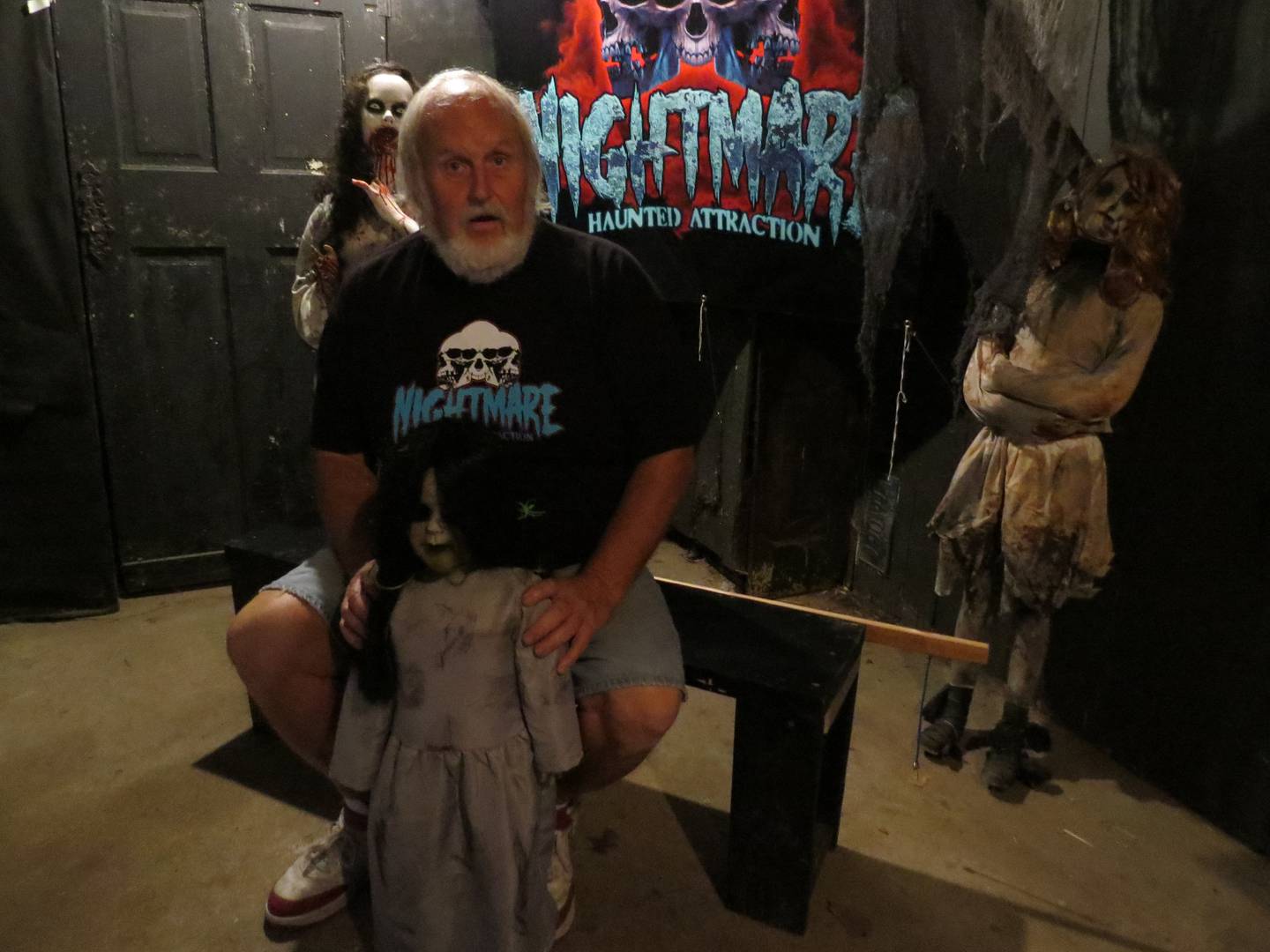 Dave Mead poses for a photo inside the Nightmare Attraction at Bureau County Fairgrounds. This is Mead's 18th year working on the haunt.