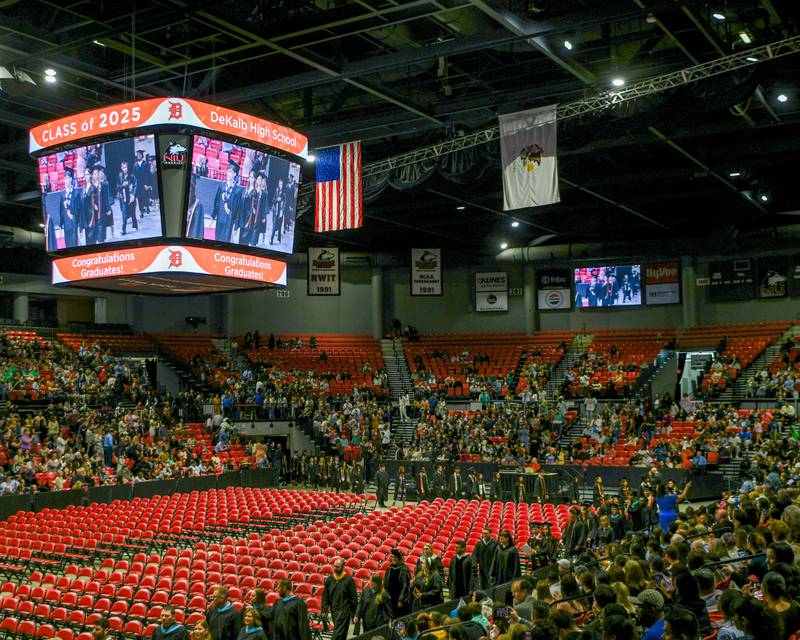 DeKalb High School staff and seniors on Saturday, May 24, 2025, enter the Northern Illinois University Convocation Center in DeKalb for the Class of 2025 Commencement ceremony.