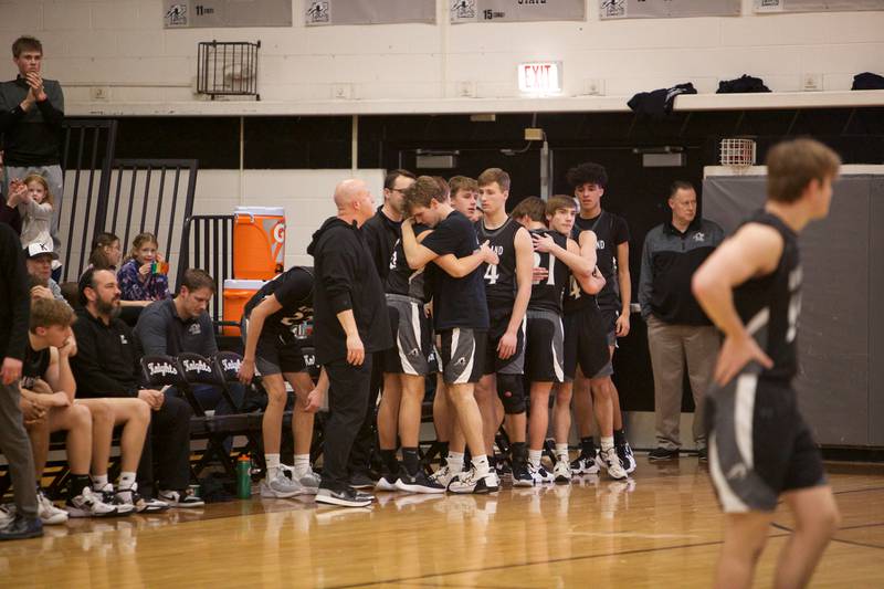 Kaneland players react to the loss against Marmion Academy at the Class 3A Regional Final at Kaneland on Saturday, Feb.25, 2023.