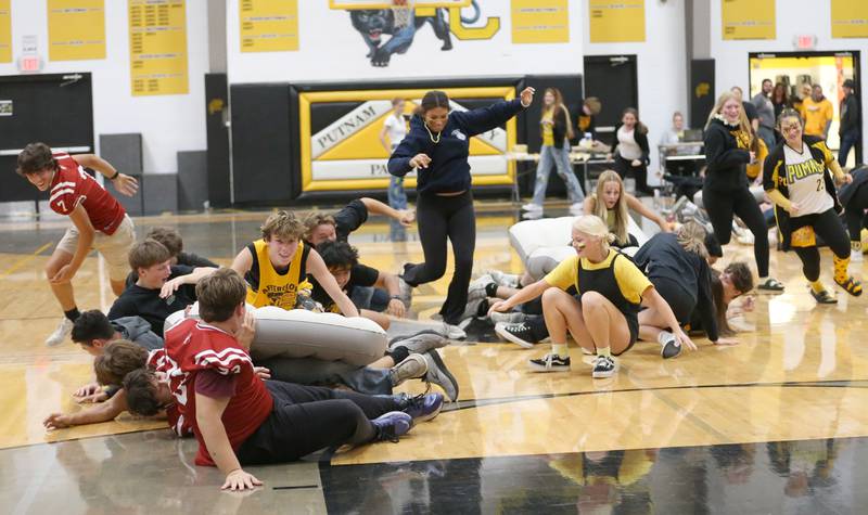 Putnam County High School students play ride the wave during the football Homecoming Pep Rally on Friday, Sept. 27, 2024 at Putnam County High School in Granville.