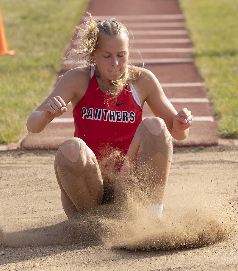 Erie-Prophestown’s Lauren Punke lands her triple jump attempt Wednesday, May 13, 2026, during the Class 1A Erie Sectional meet.
