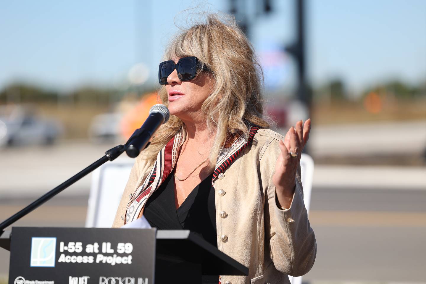 Diane Cullinan Oberhelman, of Cullinan Properties, speaks at the ribbon cutting for the opening of the I-55 and IL 59 interchange on Monday, Oct. 7, 2024 in Joliet.