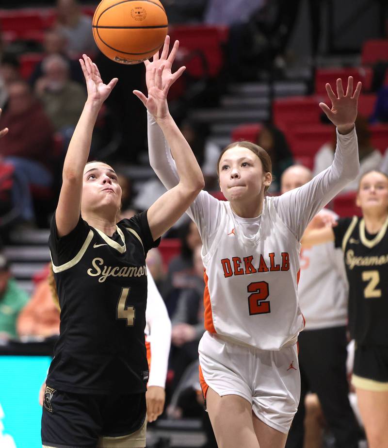 Sycamore's Layla Janisch and DeKalb's Emma Craig go after a rebound Friday, Jan. 30, 2026, during their game in the FNBO Challenge in the Convocation Center at Northern Illinois University in DeKalb.