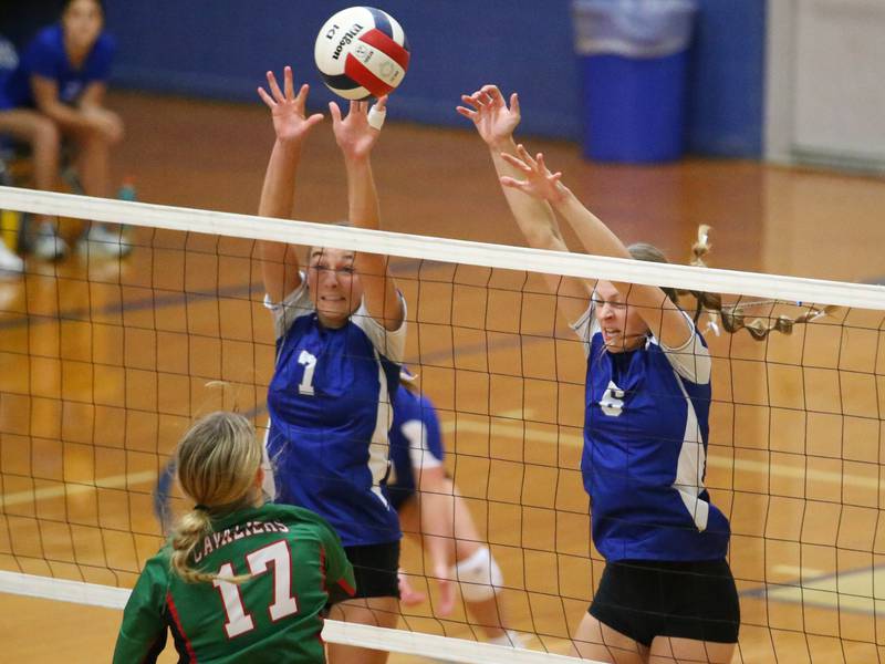 Princeton's Kathy Maciczak and teammate Caroline Keutzer block a spike from L-P's Mckenzie Krzyaniak on Tuesday, Aug. 27, 2024 at Princeton High School.