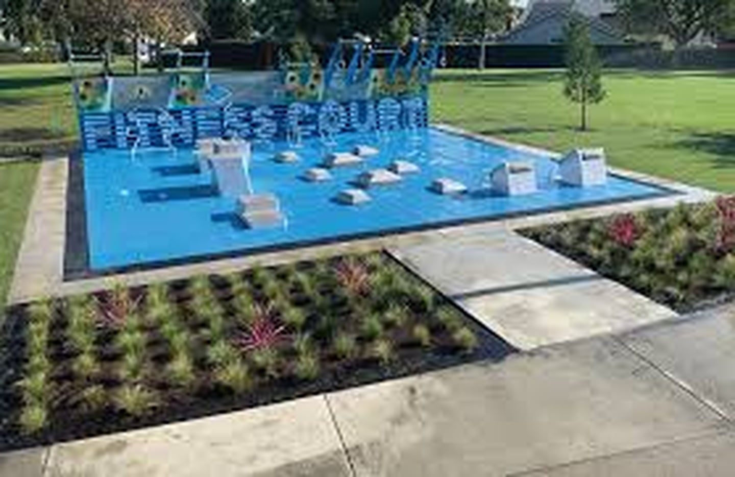 A rendering shows what a proposed fitness court from the National Fitness Campaign could look like outside of Kankakee High School.