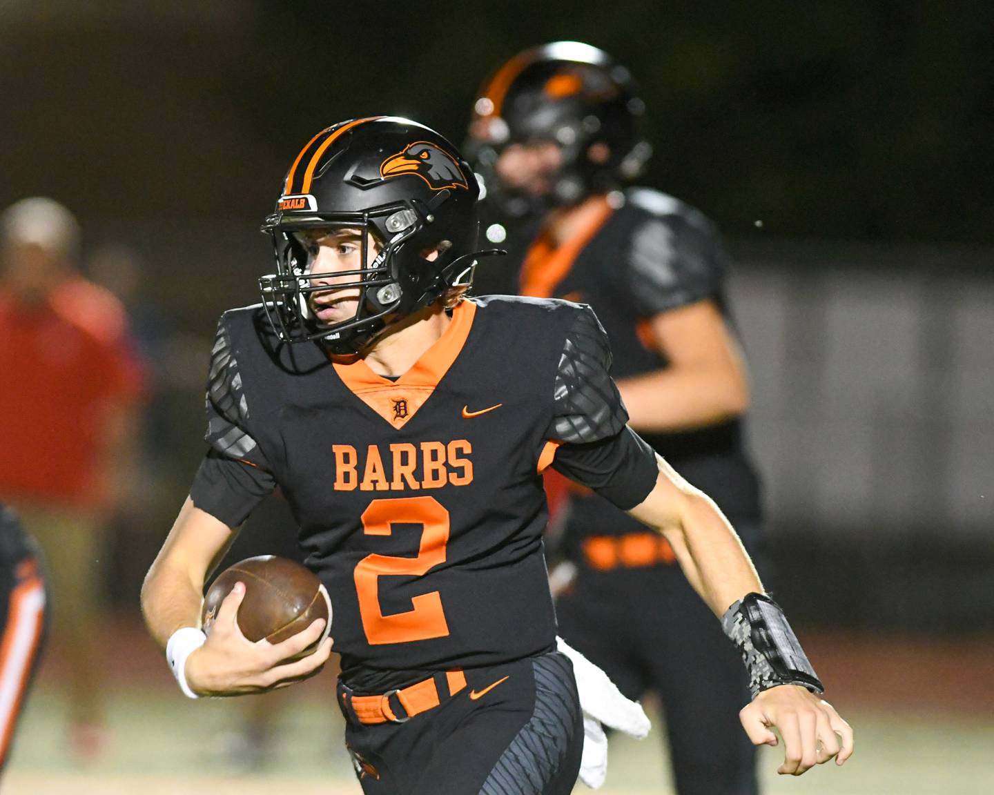 DeKalb's Cole Latimer (2) runs the ball during the first quarter on Friday Sept. 20, 2024, while taking on Lincoln-Way Central held at DeKalb High School.