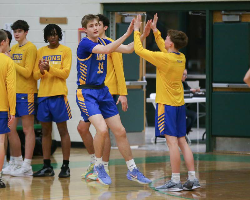 Lyon's Ian Polonowski (35) is introduced before their basketball game between Lyons at York. Jan 10, 2025 in Elmhurst.