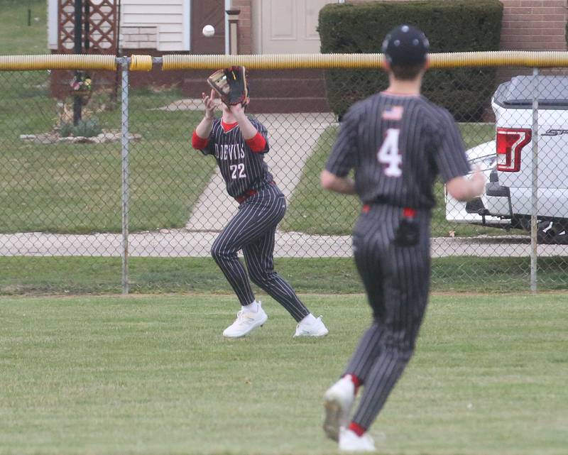Hall's Evan Stefaniak makes a catch in left field as teammate Luke Bryant watches on Wednesday, March 13, 2024 at Kirby Park in Spring Valley.