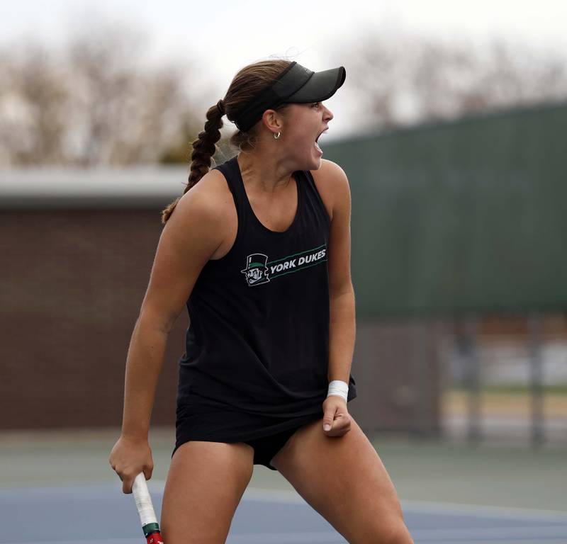 Caroline “CJ” Coan of York reacts after winning the 2A Singles Championship match Saturday, Oct. 25, 2025 at John Hersey High School in Arlington Heights.