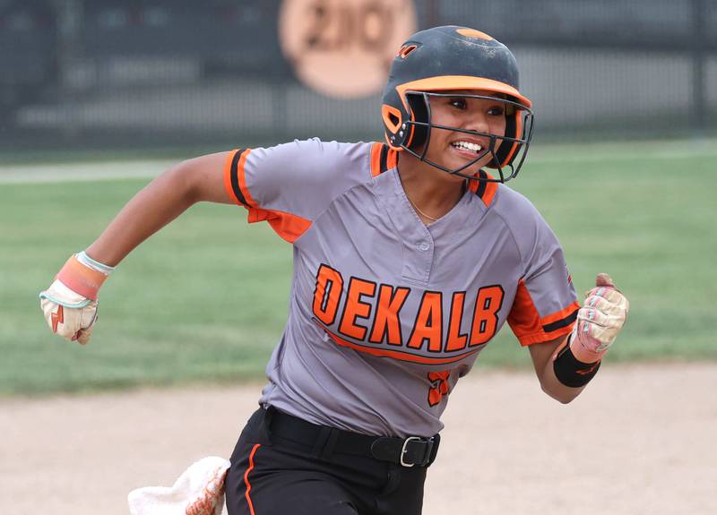 DeKalb's Alaynna Johnson rounds second base on her way to a leadoff triple Tuesday, May 19, 2026, during their Class 4A regional game against Harlem at DeKalb High School.