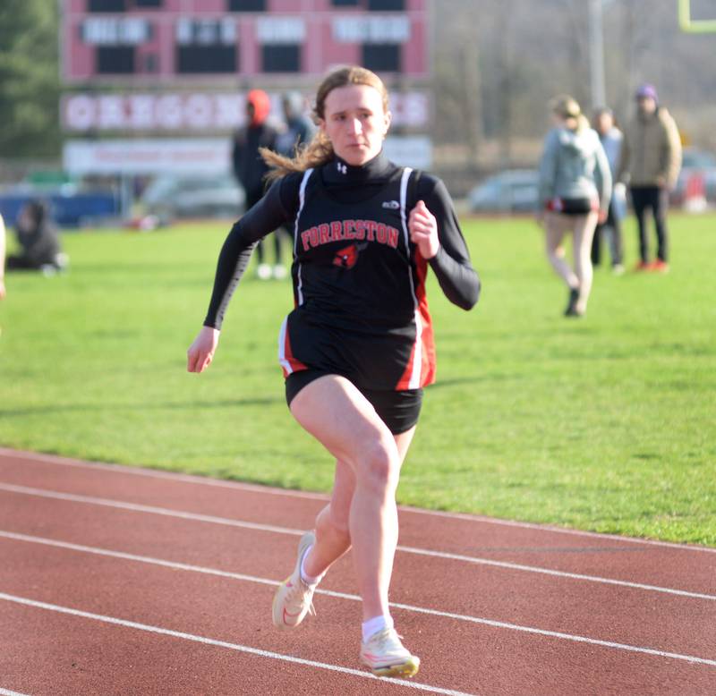 Forreston-Polo's Bree Schneiderman finished first in the 100 meter dash at Oregon High School on Thursday, April 3, 2025.