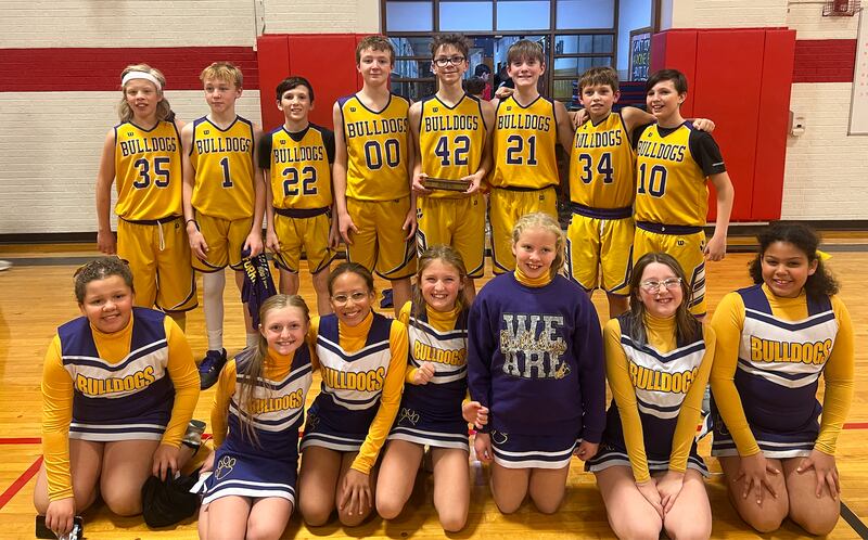 The Ohio Bulldogs defeated Ladd 40-21 to capture third place in the BVEC Tournament at Ladd on Thursday, Dec. 12.  Team members and cheerleaders are (front row, from left) Brooklyn Pratt, Austyn Britton, Leah Bell, Charleigh Philbrook, Rabecca May, Emmerson Benson and Mya Bell; and (back row)  Paul May, Levi Forristall, Mason Cirrincione, Luke Forristall, Cole Deery, Conner Hanen, Steven Philbrook and Marshall Cirrincione.