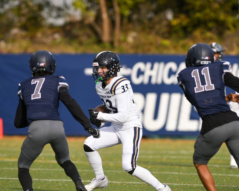 IC Catholic Prep's Jack Schaul (33) runs the ball during the game against Chicago Hope Academy on Saturday Nov. 1, 2025, held at Altgeld Park in Chicago.