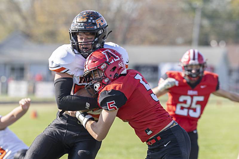 FCW’s Kelser Collins punches it in for a TD against Amboy Saturday, Nov. 4, 2023 in the 8-man semifinal game in Amboy.Saturday, Nov. 4, 2023.