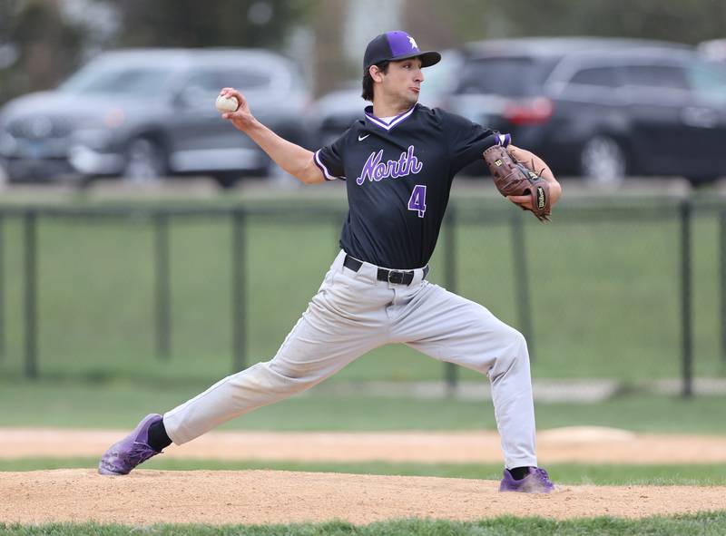 Downers Grove North's Joseph Chiarelli (4) pitches in the first inning during the varsity baseball game between Downers Grove South and Downers Grove North in Downers Grove on Saturday, April 29, 2023.