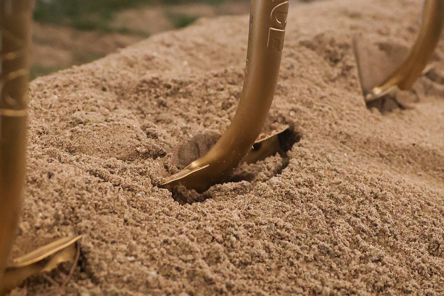 Ceremonial shovels sit in the dirt at the Village of Shorewood YCMA groundbreaking ceremony on Thursday, Nov. 21, 2024 in Shorewood.