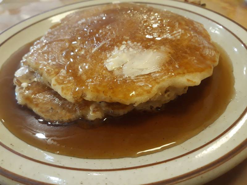 A short stack of pancakes at Country House Restaurant in La Salle drowned in syrup.
