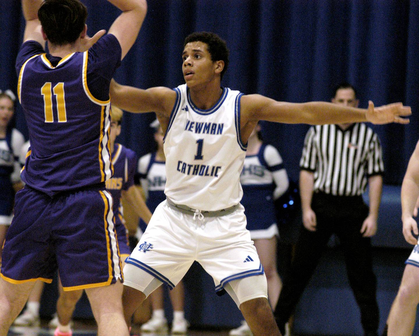 Newman's Tyson Williams defends against Mendota's Aden Tillman. The Newman Comets defeated the Mendota Trojans 67-66 at Newman High School in Sterling. The game took place on Tuesday, January 13, 2025.