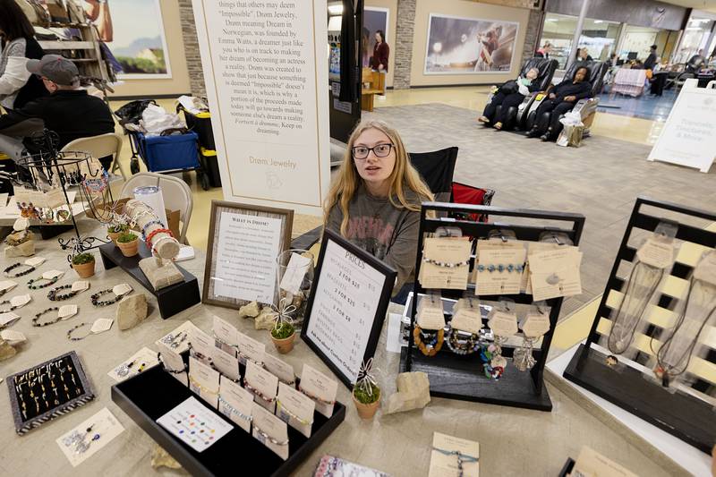 Emma Watts of Rock Falls displays jewelry under her Drom brand during an arts and crafters show Saturday, March 4, 2023 at the Northland Mall. Drom, meaning dream in Norwegian, Watts uses these ancestral roots to influence her designs.